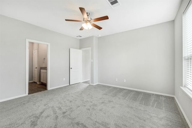 25707 Boxwood Hedge Ln, Tomball, TX 77375 - unfurnished bedroom featuring carpet, ensuite bathroom, and a ceiling fan