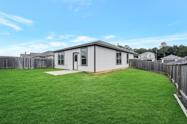 25707 Boxwood Hedge Ln, Tomball, TX 77375 - rear view of property featuring a fenced backyard and a patio area