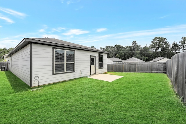 25707 Boxwood Hedge Ln, Tomball, TX 77375 - rear view of house with a fenced backyard and a patio