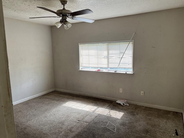 8611 Sherrywood Dr, Houston, TX 77044 - spare room with carpet flooring, a textured ceiling, and a ceiling fan