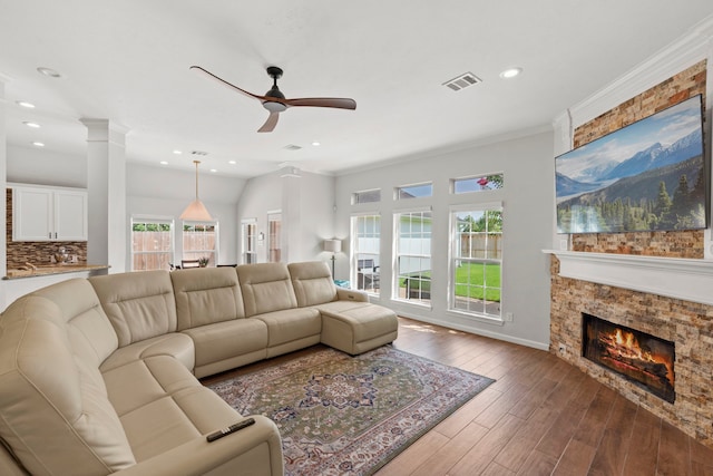 21403 Wild Jasmine Ln, Katy, TX 77450 - living room with ceiling fan, wood finished floors, recessed lighting, a fireplace, and ornamental molding