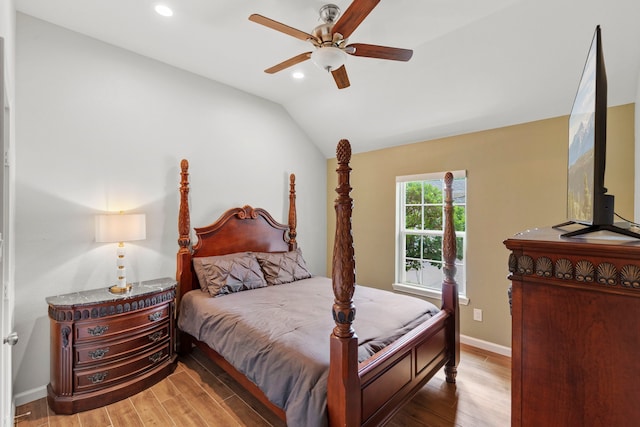 21403 Wild Jasmine Ln, Katy, TX 77450 - bedroom featuring wood finished floors, vaulted ceiling, recessed lighting, and ceiling fan