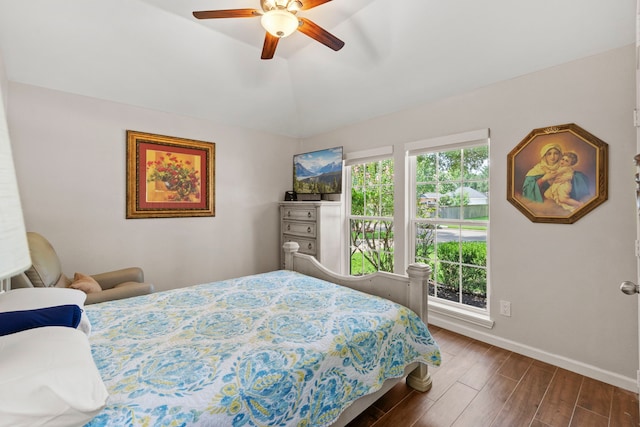 21403 Wild Jasmine Ln, Katy, TX 77450 - bedroom with wood finished floors, ceiling fan, and lofted ceiling