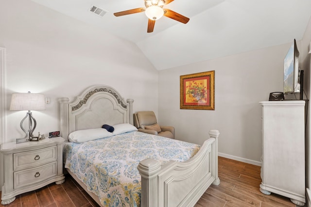 21403 Wild Jasmine Ln, Katy, TX 77450 - bedroom featuring dark wood-style flooring, vaulted ceiling, and ceiling fan