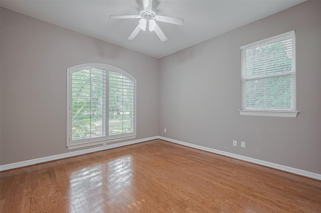6210 Mahogany Way, Magnolia, TX 77354 - unfurnished room featuring wood finished floors, vaulted ceiling, and ceiling fan