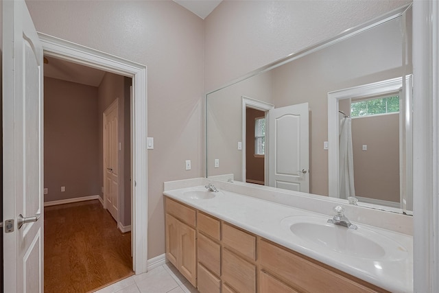 6210 Mahogany Way, Magnolia, TX 77354 - full bath with double vanity and tile patterned flooring