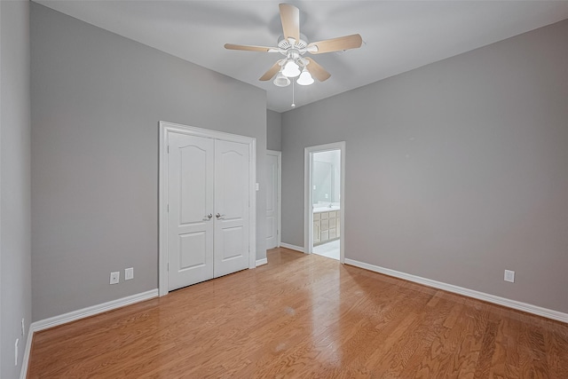 6210 Mahogany Way, Magnolia, TX 77354 - unfurnished bedroom featuring light wood finished floors, ensuite bathroom, a closet, and ceiling fan