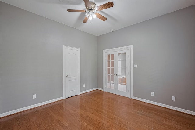 6210 Mahogany Way, Magnolia, TX 77354 - empty room featuring french doors, wood finished floors, and a ceiling fan