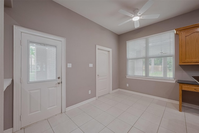 6210 Mahogany Way, Magnolia, TX 77354 - unfurnished dining area with ceiling fan and light tile patterned floors