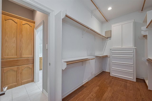 6210 Mahogany Way, Magnolia, TX 77354 - spacious closet featuring light wood-style floors