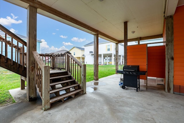 989 Biscayne, Crystal Beach, TX 77650 - view of patio featuring stairs, grilling area, and a residential view