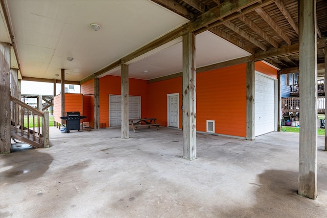 989 Biscayne, Crystal Beach, TX 77650 - view of patio / terrace with a garage, stairway, and area for grilling