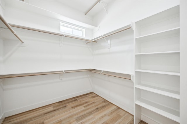 2221 Bevis St, Houston, TX 77008 - walk in closet featuring light wood-type flooring