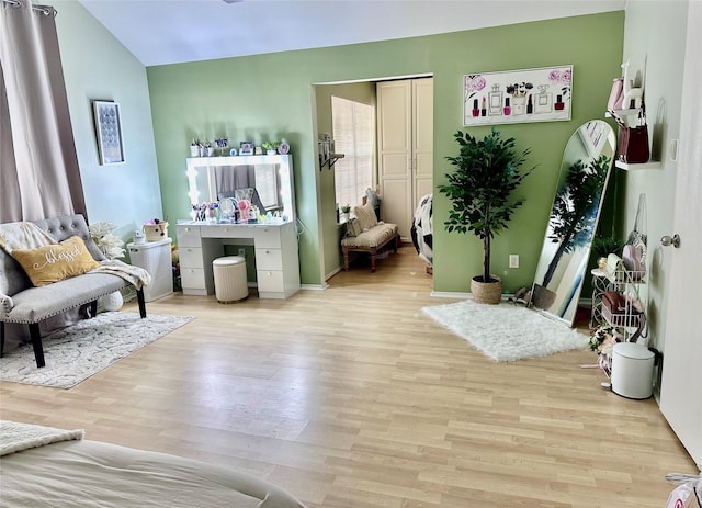 11815 Pebble Sands Dr, Tomball, TX 77375 - sitting room with light wood finished floors and vaulted ceiling
