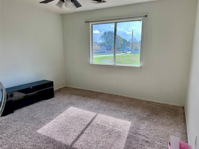 11815 Pebble Sands Dr, Tomball, TX 77375 - carpeted spare room featuring a ceiling fan and baseboards