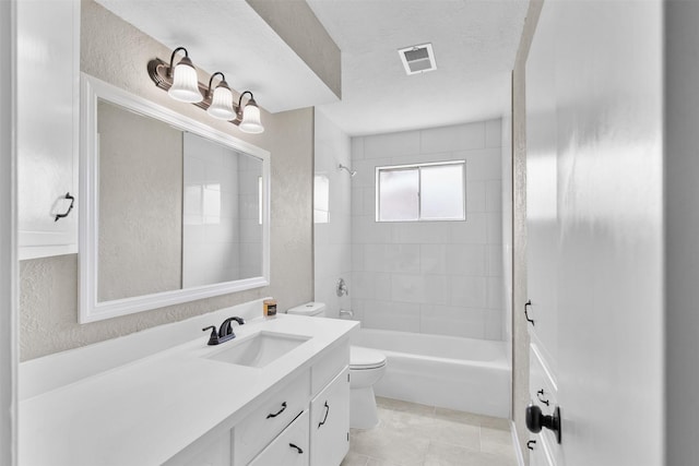 21807 Glenbranch Dr, Spring, TX 77388 - bathroom featuring vanity, shower / bathtub combination, tile patterned floors, and a textured wall
