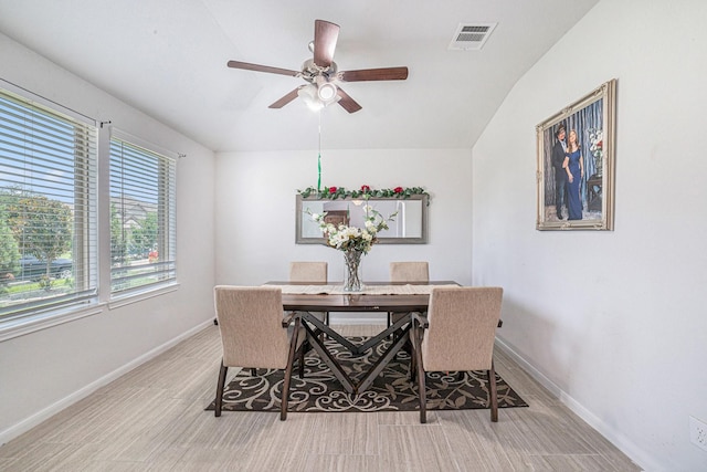 21323 Cypress Live Oak, Cypress, TX 77433 - dining area featuring wood finished floors, vaulted ceiling, and a ceiling fan