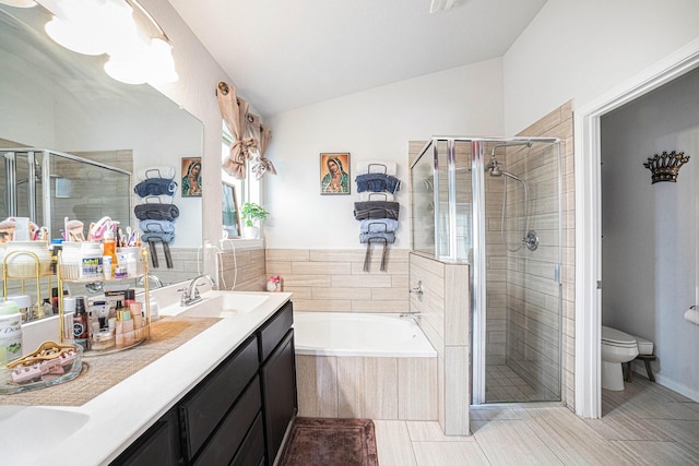 21323 Cypress Live Oak, Cypress, TX 77433 - full bathroom with a stall shower, a bath, lofted ceiling, double vanity, and tile patterned floors