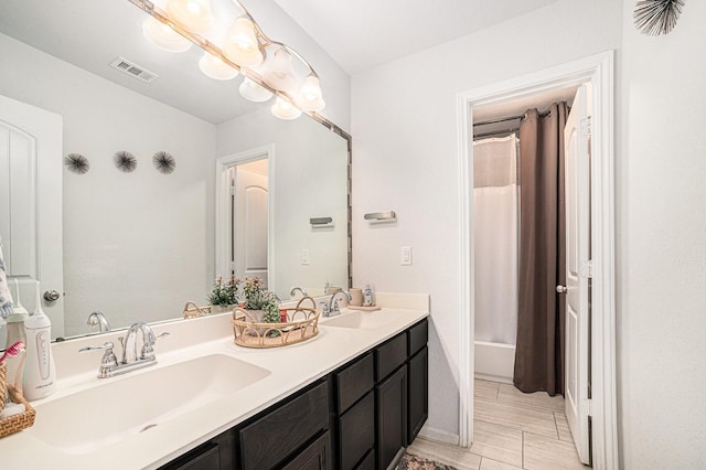 21323 Cypress Live Oak, Cypress, TX 77433 - bathroom featuring double vanity and baseboards
