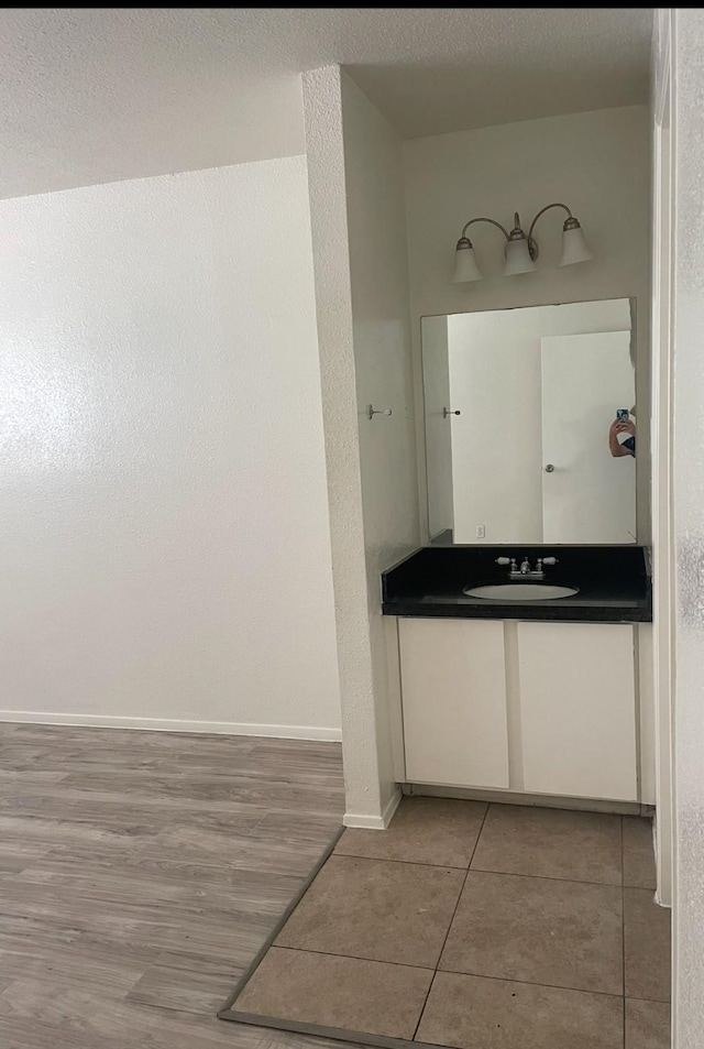 8405 Wilcrest Dr Unit 1606, Houston, TX 77072 - bathroom with vanity and tile patterned flooring