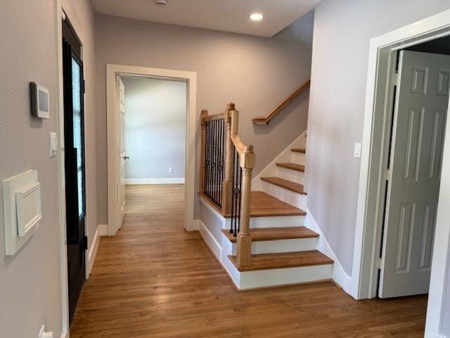 3210 Oakmont St, Houston, TX 77021 - stairs with wood finished floors and recessed lighting
