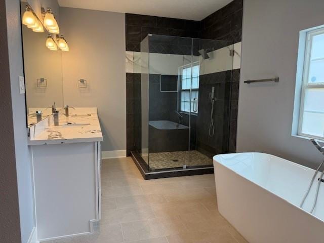 3210 Oakmont St, Houston, TX 77021 - bathroom with a freestanding bath, vanity, and a shower stall