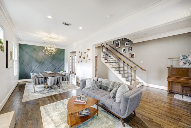 818 Waverly St, Houston, TX 77007 - living room with a chandelier, stairs, wood finished floors, ornamental molding, and recessed lighting