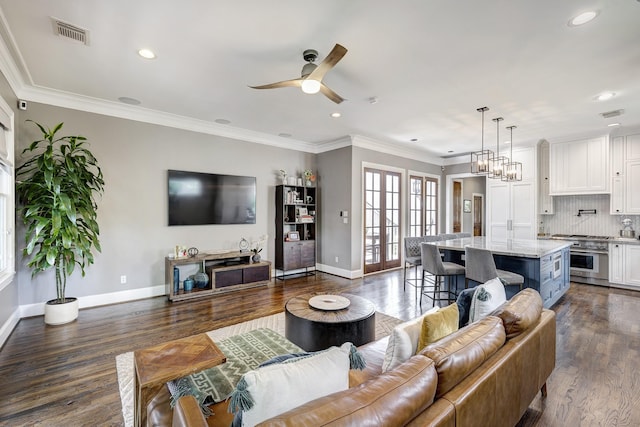 818 Waverly St, Houston, TX 77007 - living room featuring recessed lighting, ceiling fan, dark wood finished floors, and crown molding