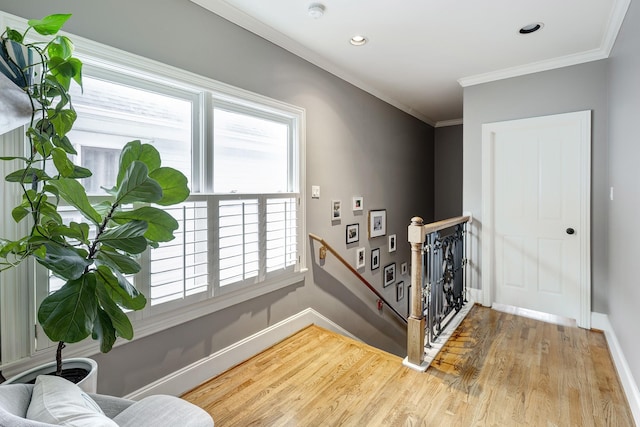 818 Waverly St, Houston, TX 77007 - staircase featuring wood finished floors, crown molding, and recessed lighting
