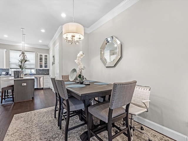 9660 Knight Rd, Houston, TX 77045 - dining room with ornamental molding, dark wood-style flooring, a chandelier, and recessed lighting