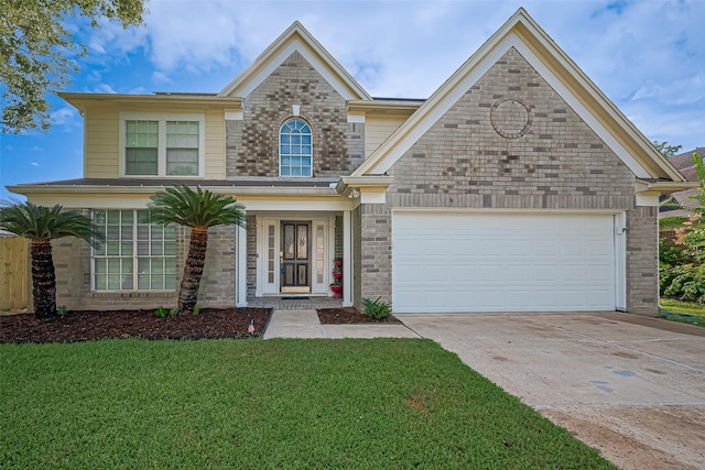 4001 Spring Garden Dr, Pearland, TX 77584 - view of front of property featuring brick siding, driveway, a front lawn, and an attached garage