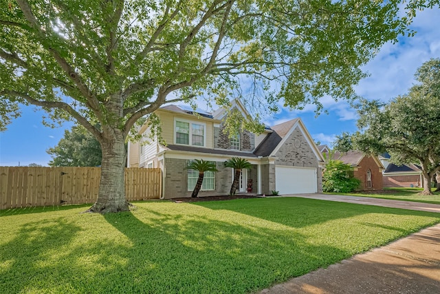 4001 Spring Garden Dr, Pearland, TX 77584 - traditional home featuring driveway, brick siding, and a garage