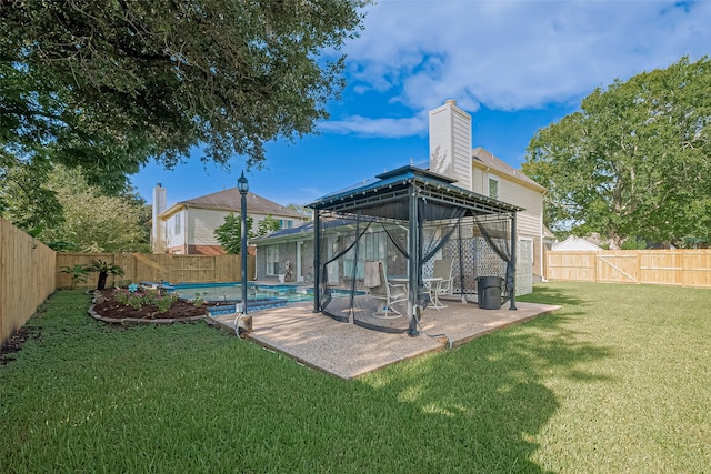 4001 Spring Garden Dr, Pearland, TX 77584 - fenced backyard featuring a gazebo and a patio area