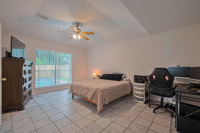 4001 Spring Garden Dr, Pearland, TX 77584 - bedroom with light tile patterned flooring, an office area, and a ceiling fan