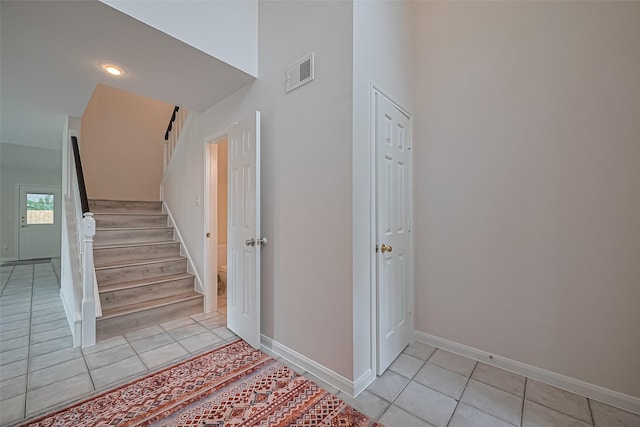 4001 Spring Garden Dr, Pearland, TX 77584 - stairway with tile patterned floors and recessed lighting