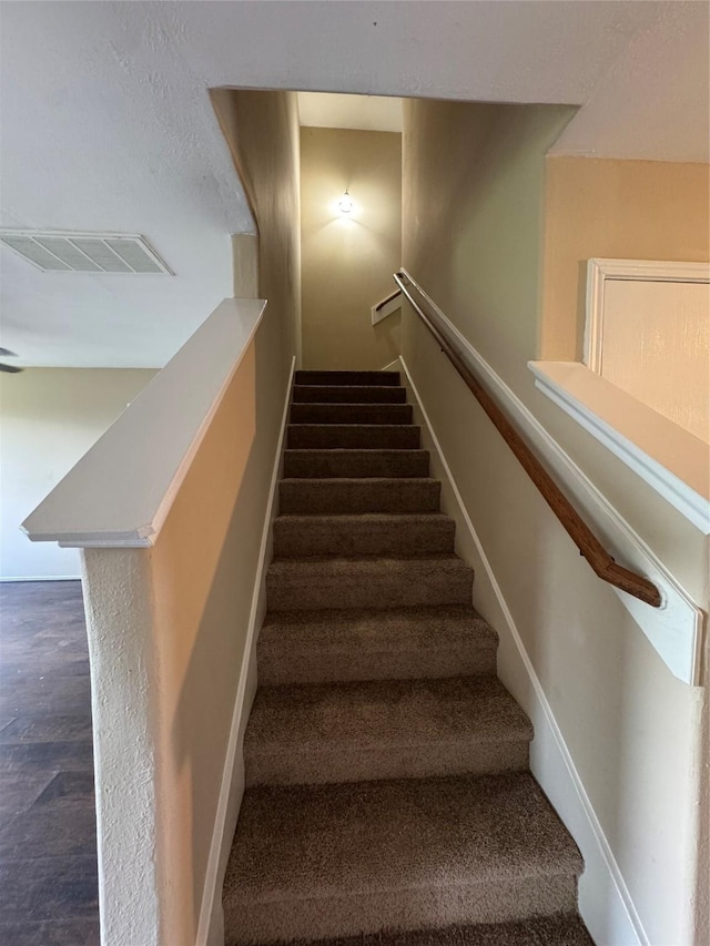 15718 Colonial Bridge Ln, Houston, TX 77073 - staircase with baseboards