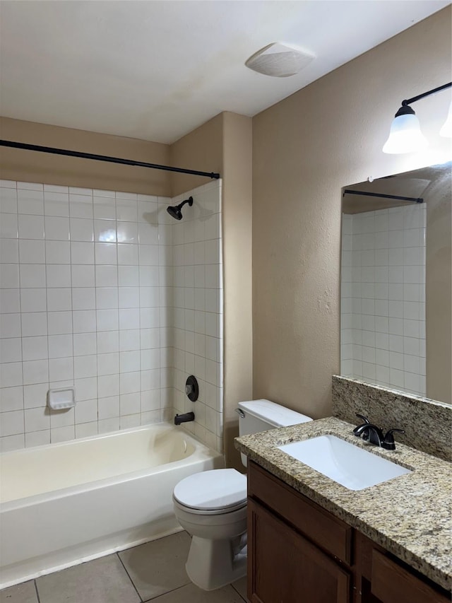15718 Colonial Bridge Ln, Houston, TX 77073 - bathroom featuring vanity, tile patterned flooring, and washtub / shower combination