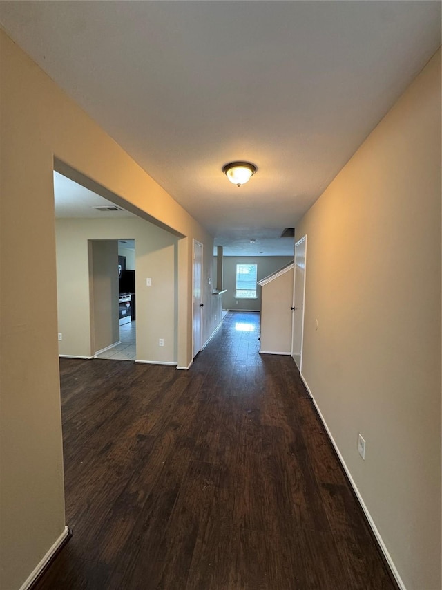 15718 Colonial Bridge Ln, Houston, TX 77073 - hall with dark wood-style flooring and baseboards
