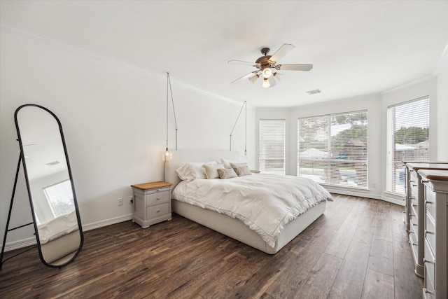 5602 Bergenfield Ct, Katy, TX 77450 - bedroom with ornamental molding, dark wood-style flooring, multiple windows, and a ceiling fan