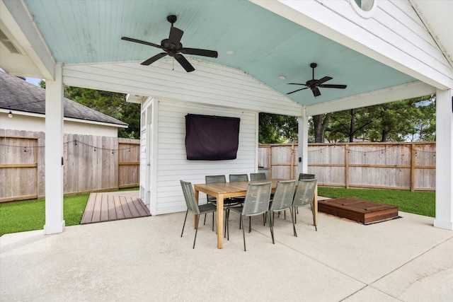 5602 Bergenfield Ct, Katy, TX 77450 - fenced backyard with ceiling fan, outdoor dining space, and a patio