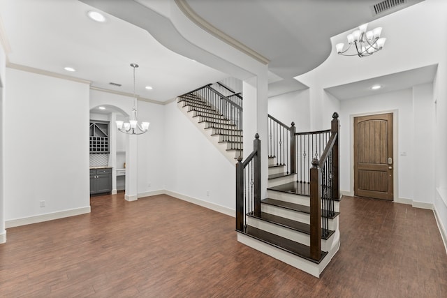10 Jarvis Row Cir, The Woodlands, TX 77380 - foyer entrance featuring a chandelier, stairway, wood finished floors, and recessed lighting