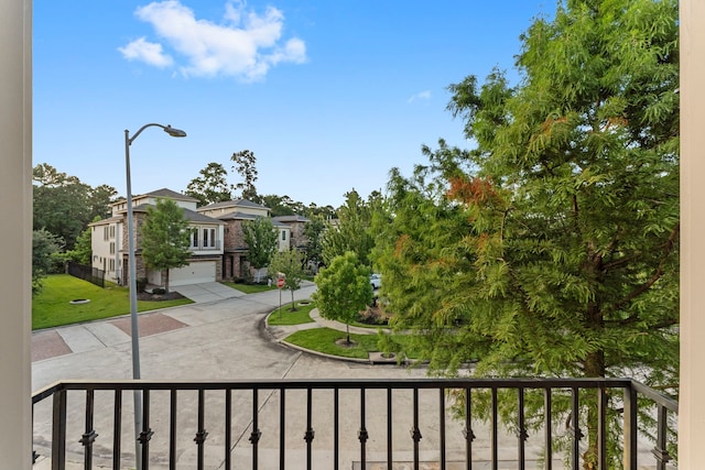 10 Jarvis Row Cir, The Woodlands, TX 77380 - view of front of house with concrete driveway, a front lawn, and an attached garage