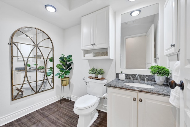 135 Wisteria Walk Cir, The Woodlands, TX 77381 - bathroom with wood finished floors and vanity