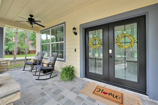 135 Wisteria Walk Cir, The Woodlands, TX 77381 - entrance to property featuring french doors and a porch