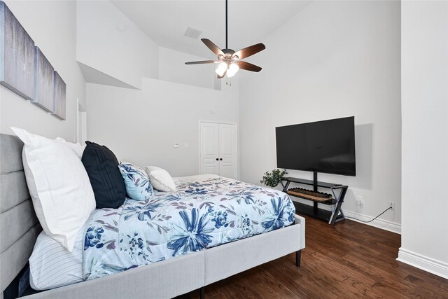 135 Wisteria Walk Cir, The Woodlands, TX 77381 - bedroom featuring wood finished floors, high vaulted ceiling, a closet, and ceiling fan