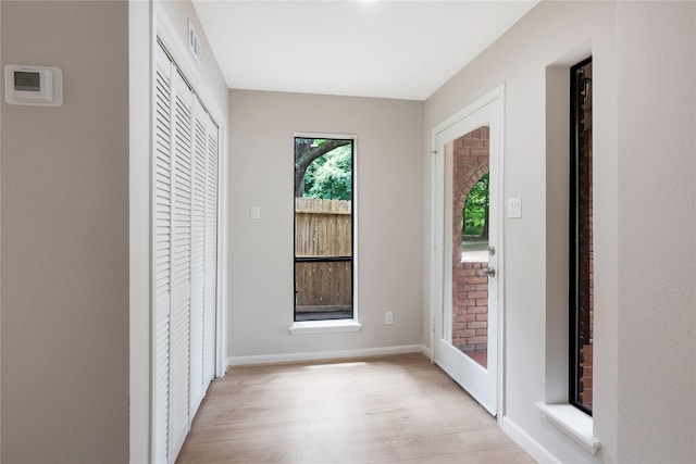 3802 Knollcrest Dr, Montgomery, TX 77356 - unfurnished bedroom featuring light wood-type flooring, a closet, and access to outside
