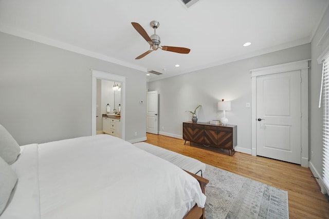 1028 Dunbar St, Houston, TX 77009 - bedroom with wood finished floors, recessed lighting, ornamental molding, ceiling fan, and connected bathroom