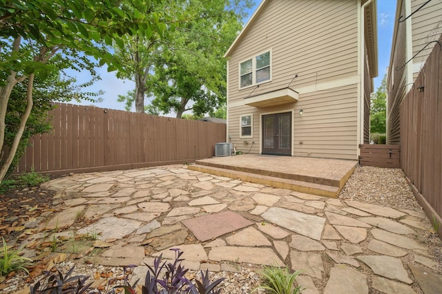 1028 Dunbar St, Houston, TX 77009 - fenced backyard featuring french doors and a patio area