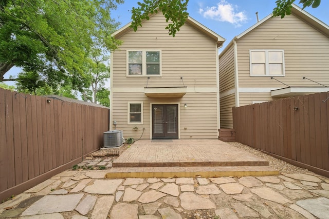 1028 Dunbar St, Houston, TX 77009 - back of property featuring french doors, a fenced backyard, and a patio area