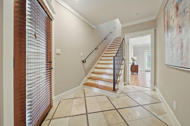 1028 Dunbar St, Houston, TX 77009 - stairs featuring tile patterned floors and baseboards